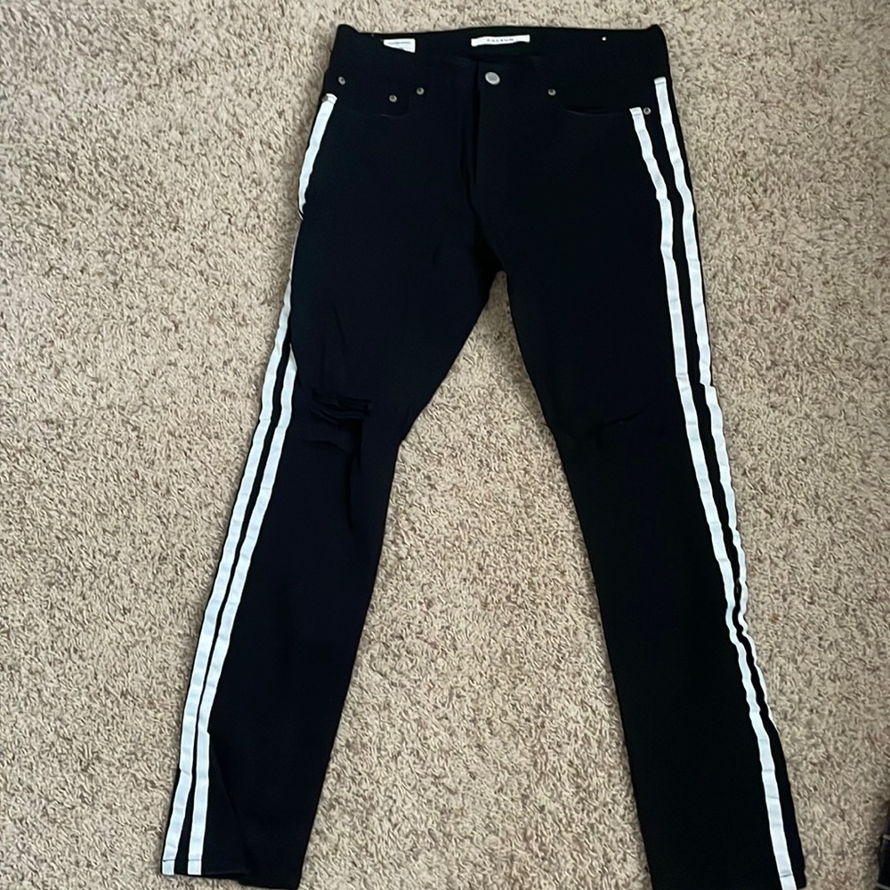 Black stacked skinny jeans